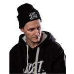 Man wearing a Just Juice black beanie hat front